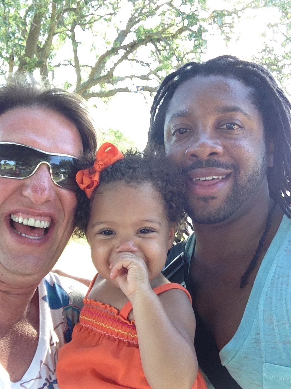 Marcus and John with their daughter โ one of many families who opened their hearts to the camera.
